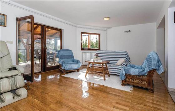 Wohnzimmer mit Terrassenzugang im Ferienhaus PRIKA Pool House, Kroatien